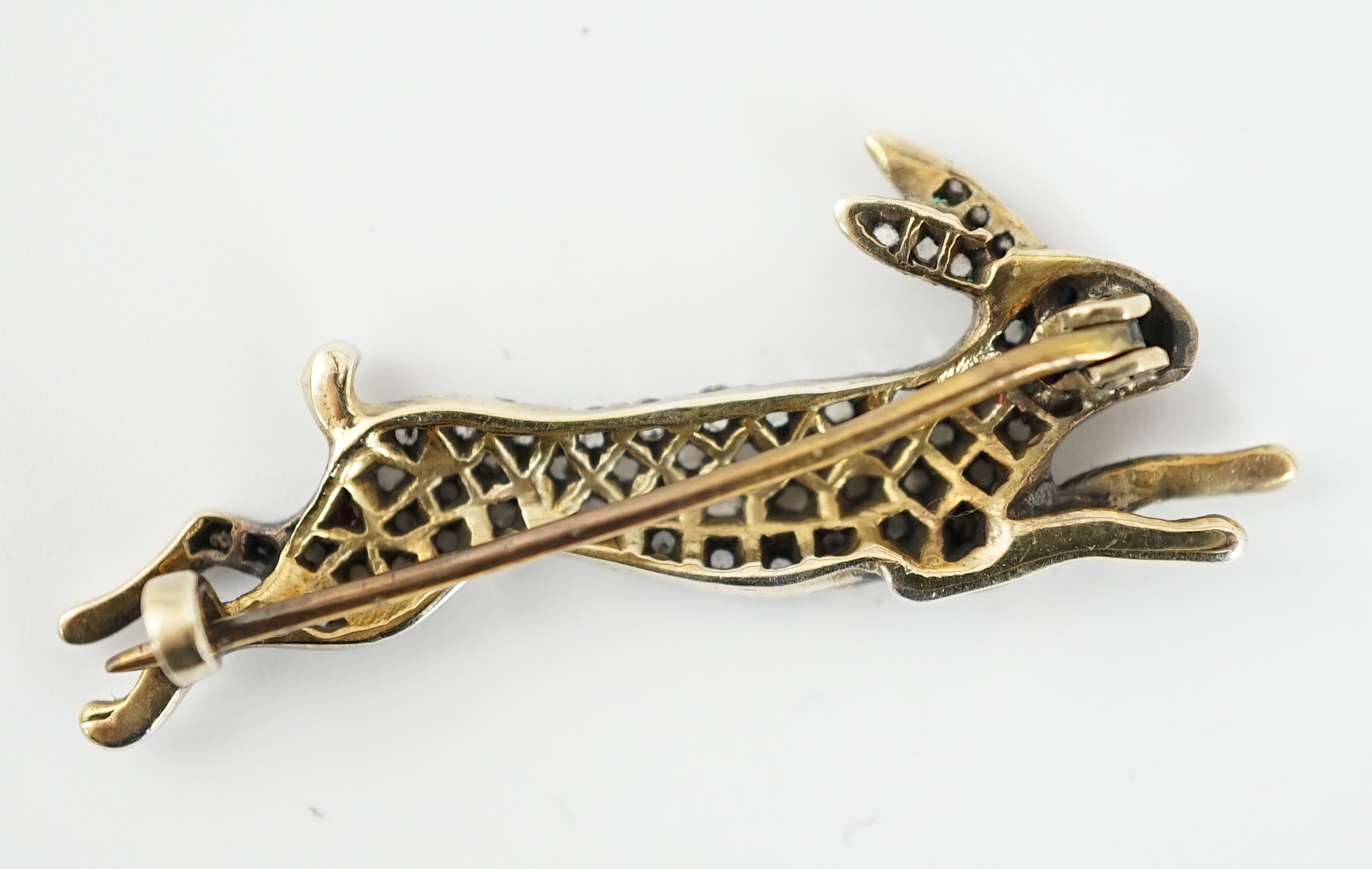 An Edwardian gold, silver and rose cut diamond cluster set hare brooch